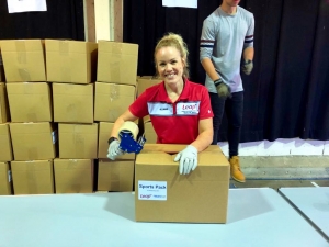 Leap team member Wendy Couzin, packing boxes ready for distribution. 