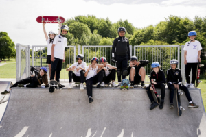 Group of children on skateboarding ramp